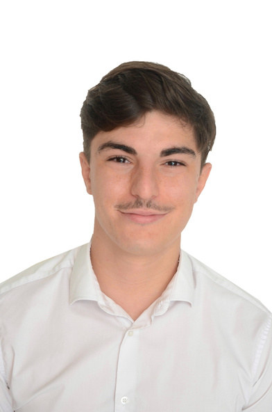 Portrait of Enzo Di-Santolo, finance and international-management professional
